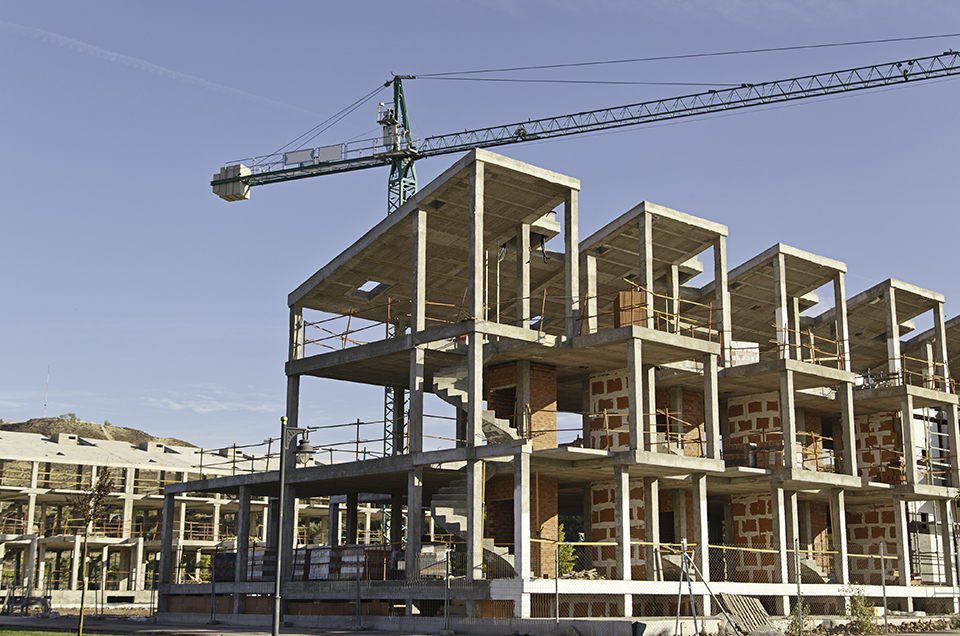 Bouwplaats waar woningen worden gebouwd