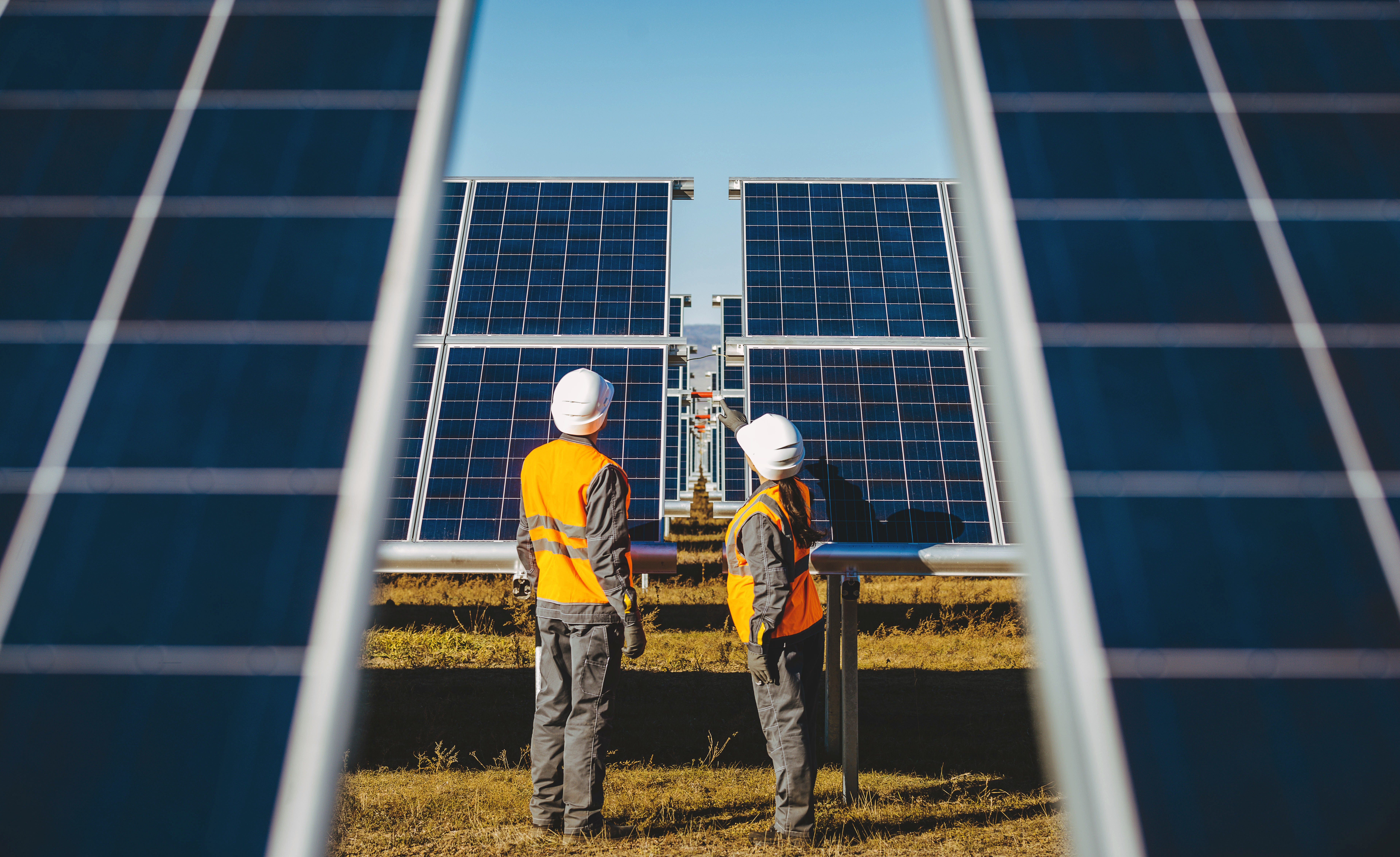 Pv plant technicians inspecting a pv field