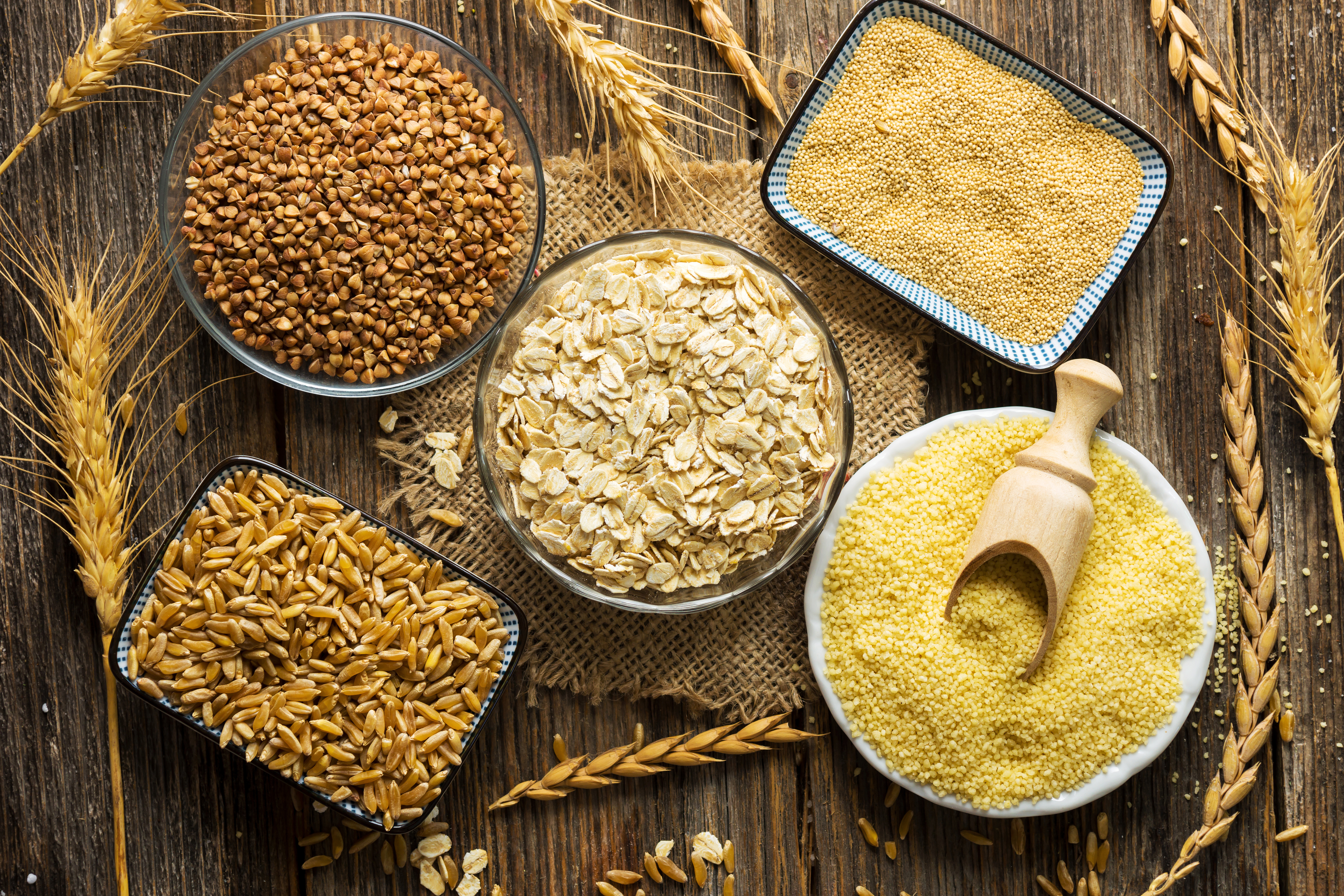 Bowls with Kiwa certified wheat,  oat, grains and couscous